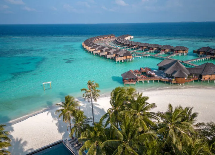 Calm ocean waters with limestone cliffs in Asia, perfect for tranquil, exotic luxury getaways.