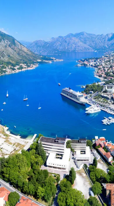 Elegant cruise ship at sunset with Travel Adventures Unlimited, offering luxury travel experiences and breathtaking ocean views