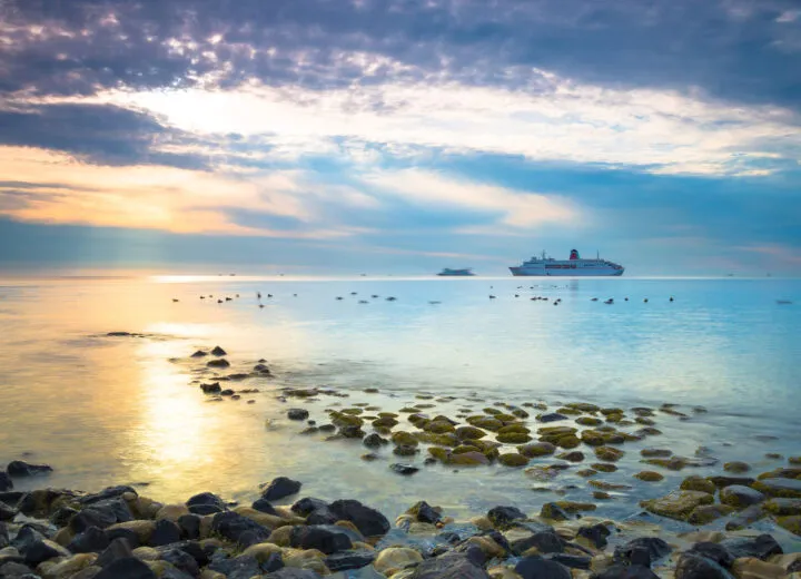 Premium cruise ships docked at port with Travel Adventures Unlimited, showcasing top cruise lines and luxury travel experiences