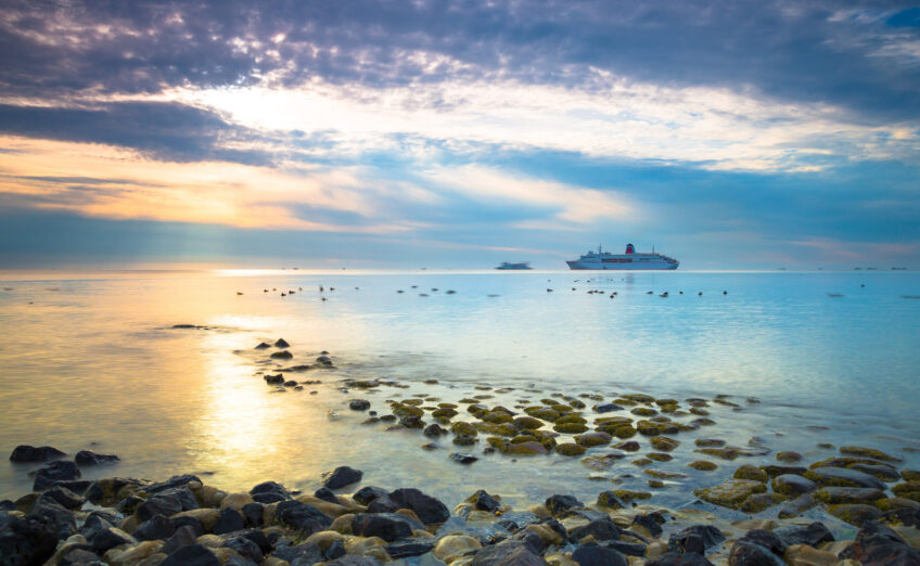 Premium cruise ships docked at port with Travel Adventures Unlimited, showcasing top cruise lines and luxury travel experiences