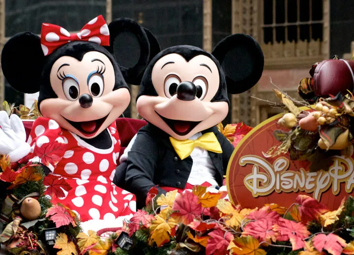 Magical Disney castle at sunset, ideal for luxury family vacations and enchanting theme park experiences