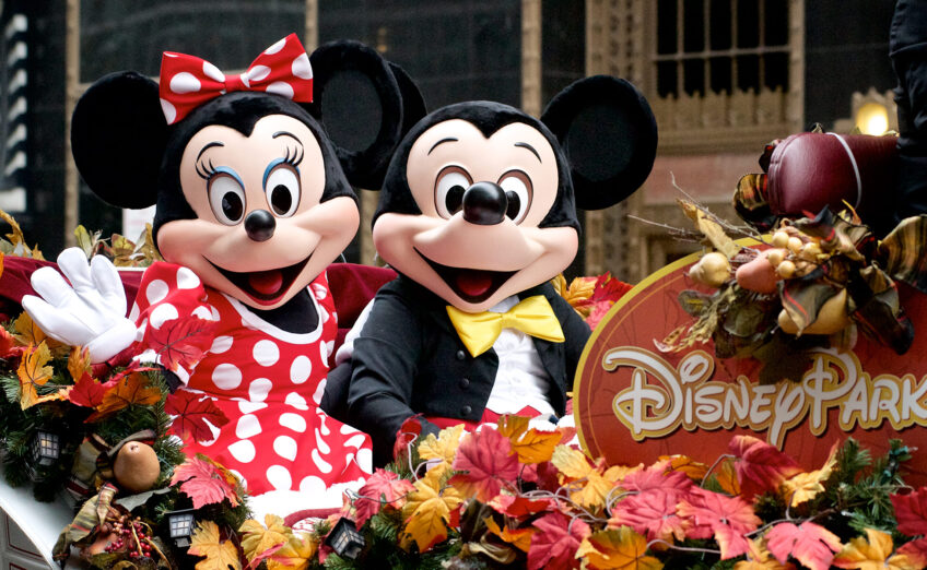 Magical Disney castle at sunset, ideal for luxury family vacations and enchanting theme park experiences