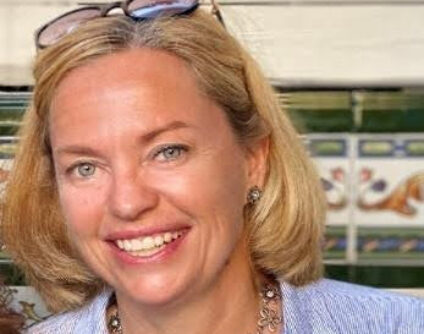 Helene Zweidinger, travel advisor at Travel Adventures Unlimited, smiling in a professional portrait