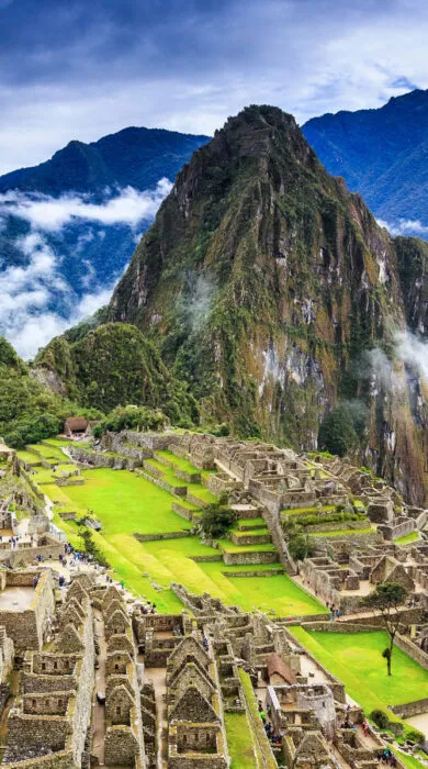 Luxury travel to Machu Picchu with scenic views of ancient Incan ruins, ideal for upscale cultural and adventure vacations