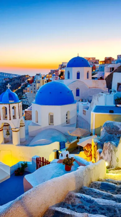 Luxury travel destination in Oia, Santorini with stunning sea views and iconic white-washed architecture