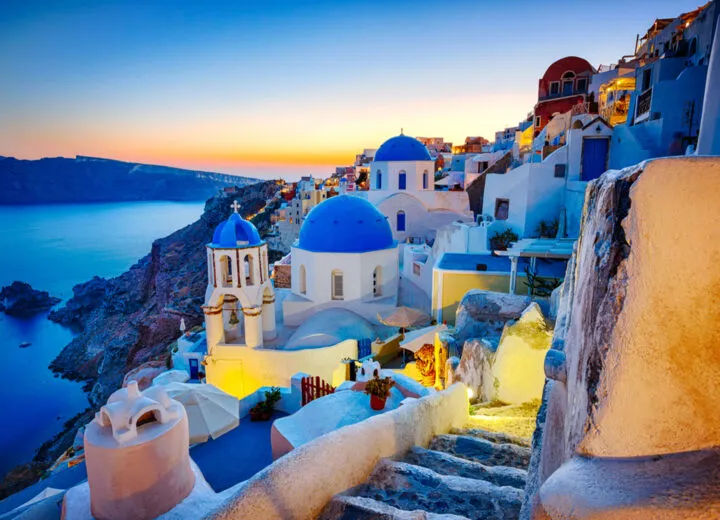 Luxury travel destination in Oia, Santorini with stunning sea views and iconic white-washed architecture