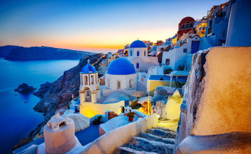 Luxury travel destination in Oia, Santorini with stunning sea views and iconic white-washed architecture