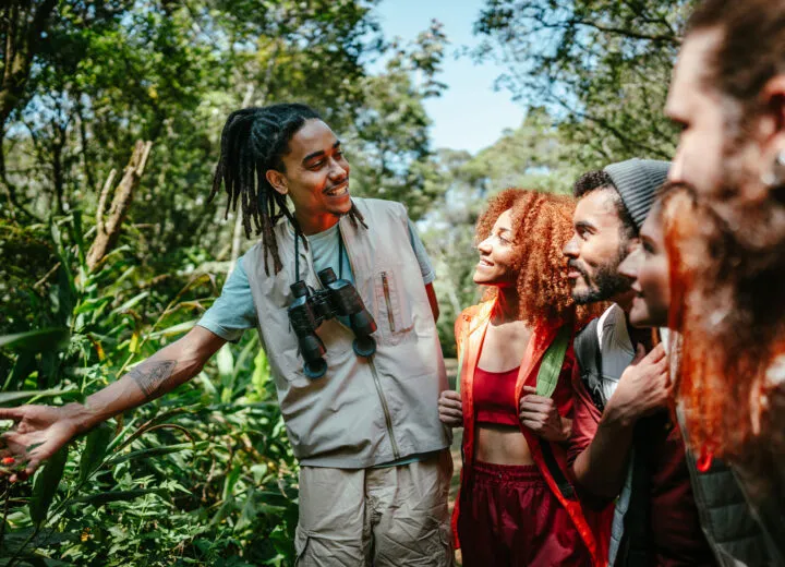 Professional tour guide leading a hosted group tour, enhancing travel with expert insights and personalized service