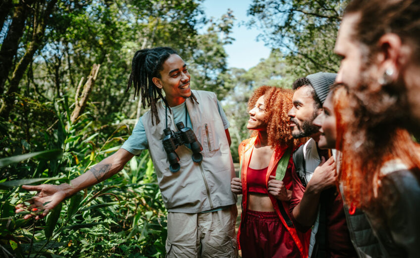 Professional tour guide leading a hosted group tour, enhancing travel with expert insights and personalized service