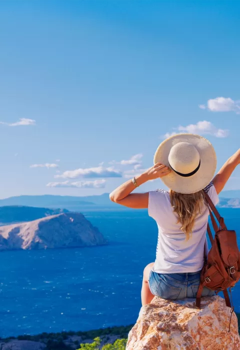 Women enjoying a scenic sunset during a Travel Adventures Unlimited vacation experience