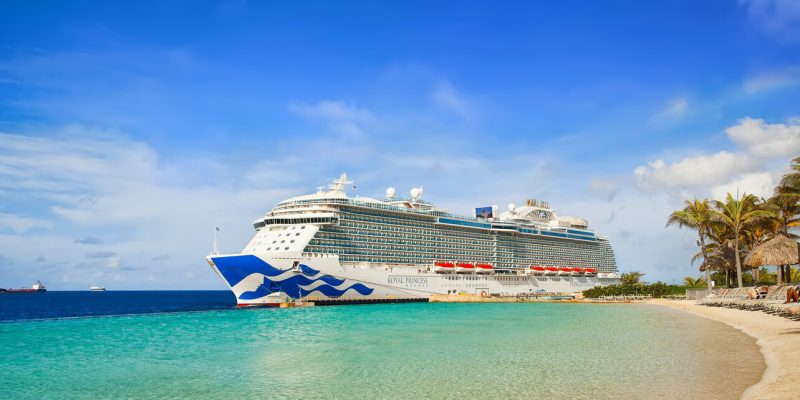 Princess Cruises ship docking at a scenic European port — luxury cruise vacation, Princess Cruises 2025, and all-inclusive travel experiences